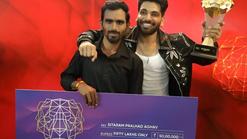The 50 Winner Shiv Thakare lifts the trophy; takes home Rs 50 lakh for a lucky fan
